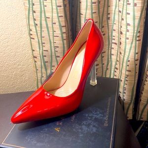 Brand new red pumps from Akita